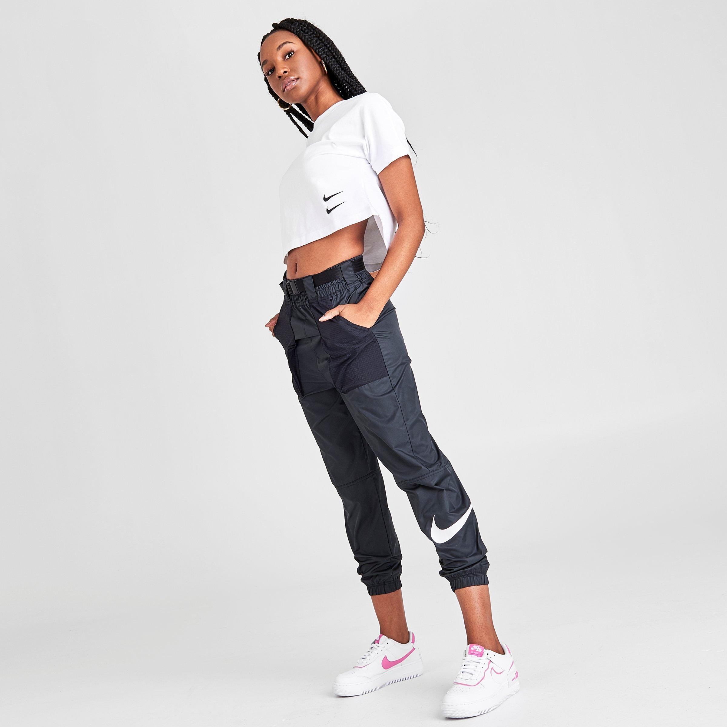 nike swoosh cuffed woven sweatpants in khaki