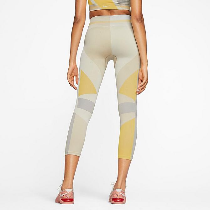 Back Left view of Women's Nike Sculpt Icon Clash Crop Running Tights in Pale Ivory/Shimmer/Laser Orange/Pale Ivory Click to zoom