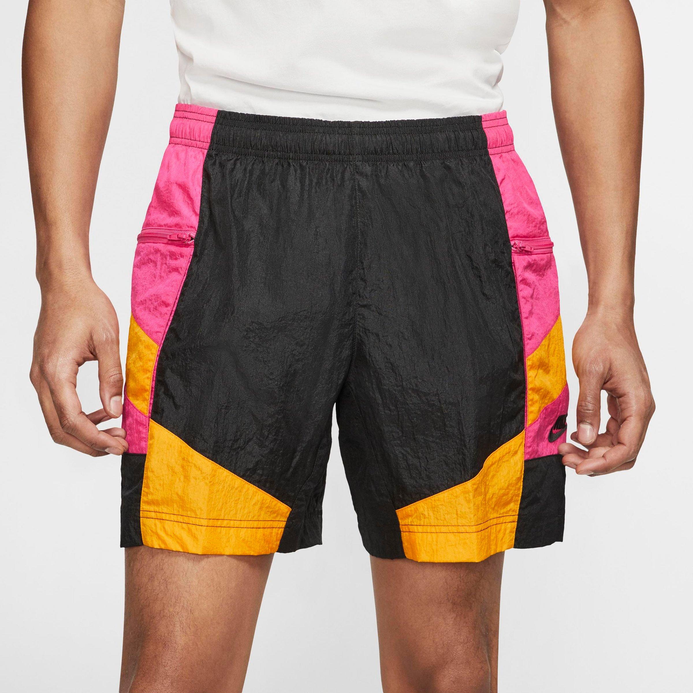 university gold nike shorts