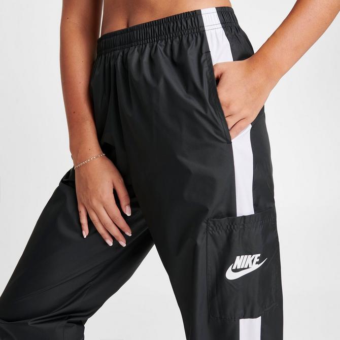 Nike Sportswear Everything Wovens Women's Mid-Rise Open-Hem Pants.