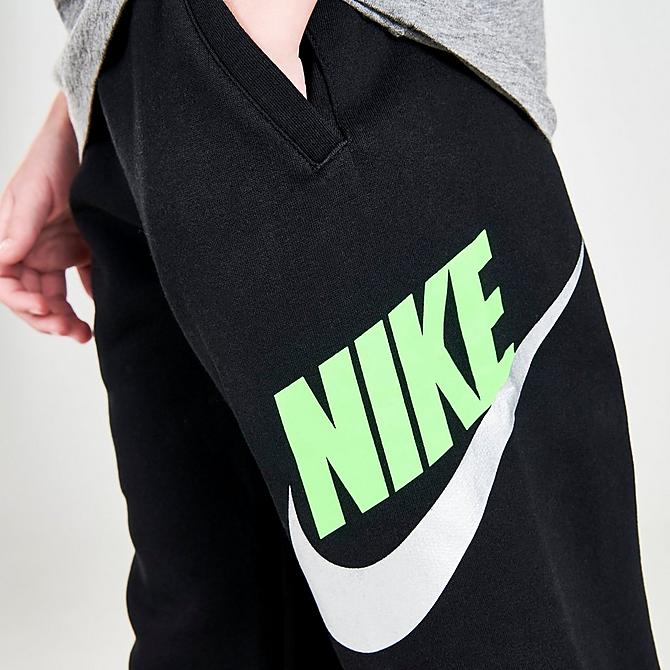 On Model 5 view of Kids' Nike Sportswear Club Fleece Jogger Pants in Black/Green Strike Click to zoom