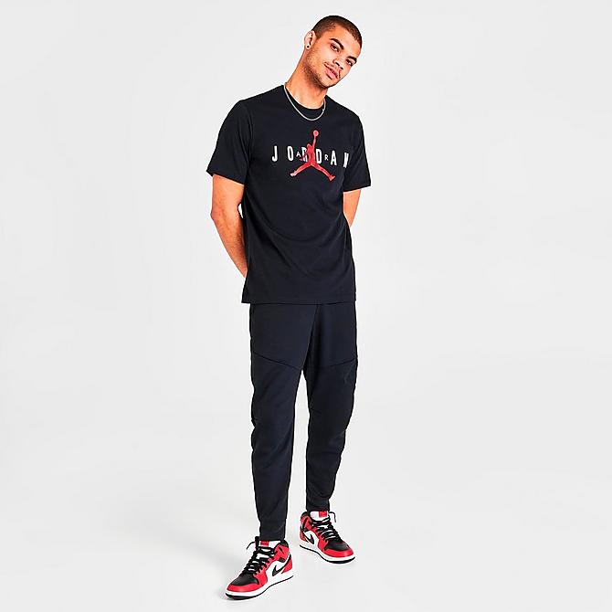 Front Three Quarter view of Men's Jordan Air Wordmark T-Shirt in Black/White/Gym Red Click to zoom