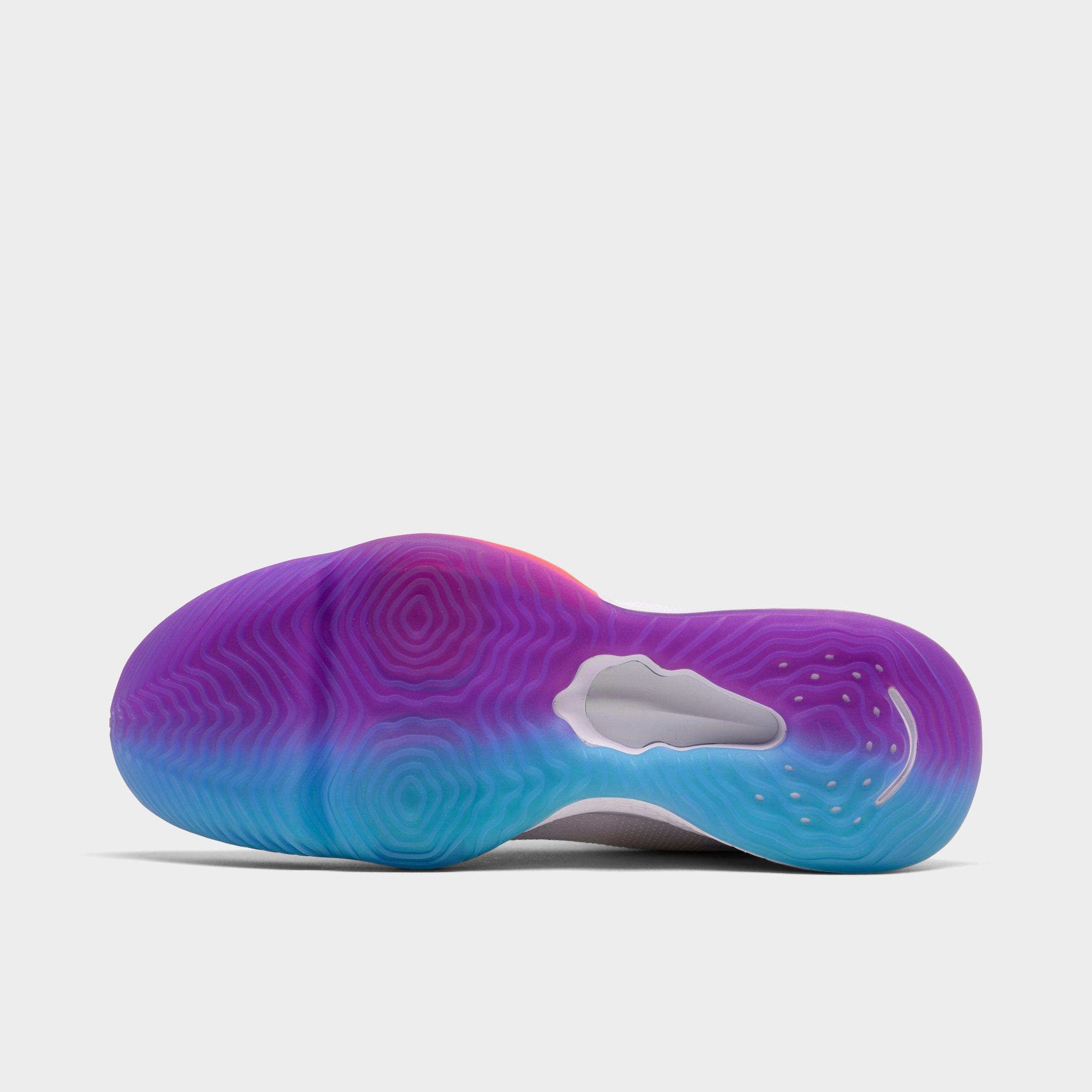 white basketball shoes with colorful bottom