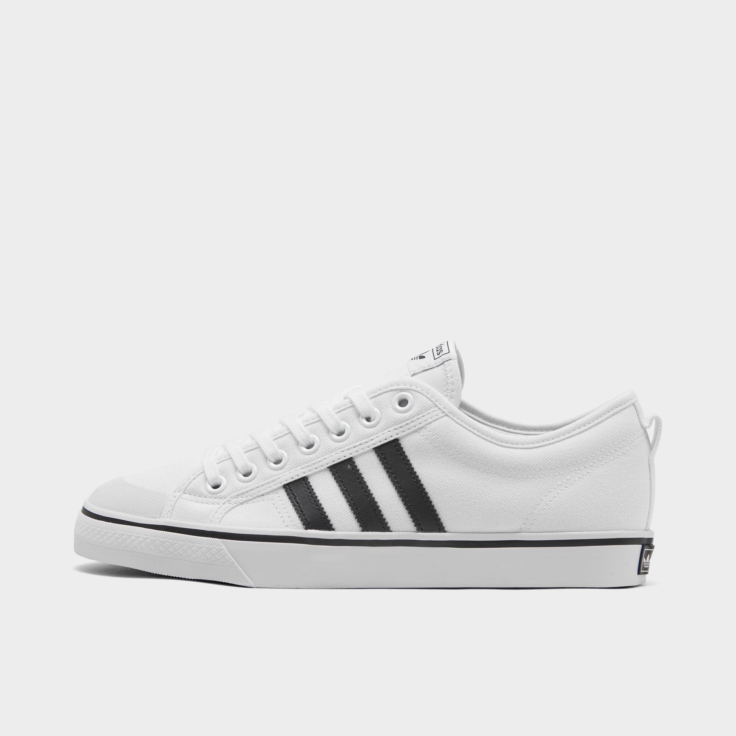 adidas originals nizza canvas trainers in white and red