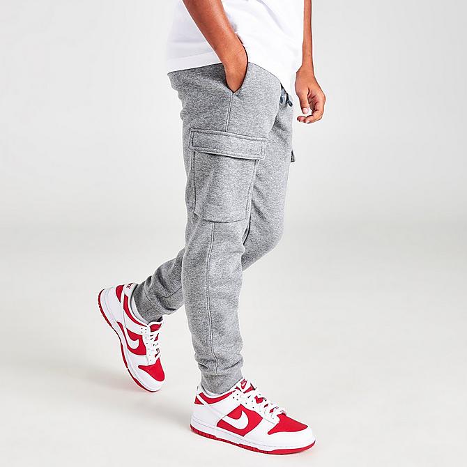 Back Left view of Boys' Nike Sportswear Club Cargo Jogger Pants in Carbon Heather/White Click to zoom