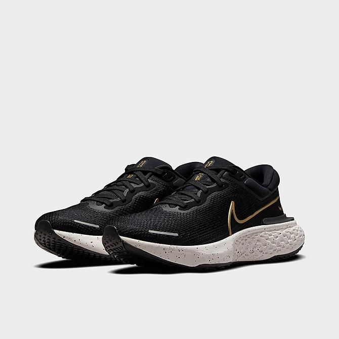 Three Quarter view of Men's Nike ZoomX Invincible Run Flyknit Running Shoes in Black/Metallic Gold/Sail Click to zoom