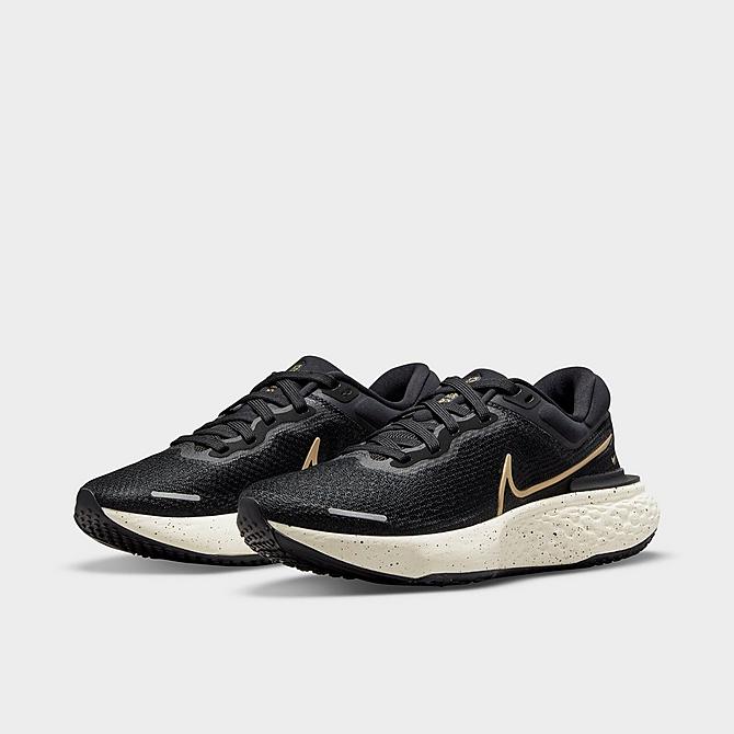 Three Quarter view of Women's Nike ZoomX Invincible Run Flyknit Running Shoes in Black/Sail/Metallic Gold Click to zoom