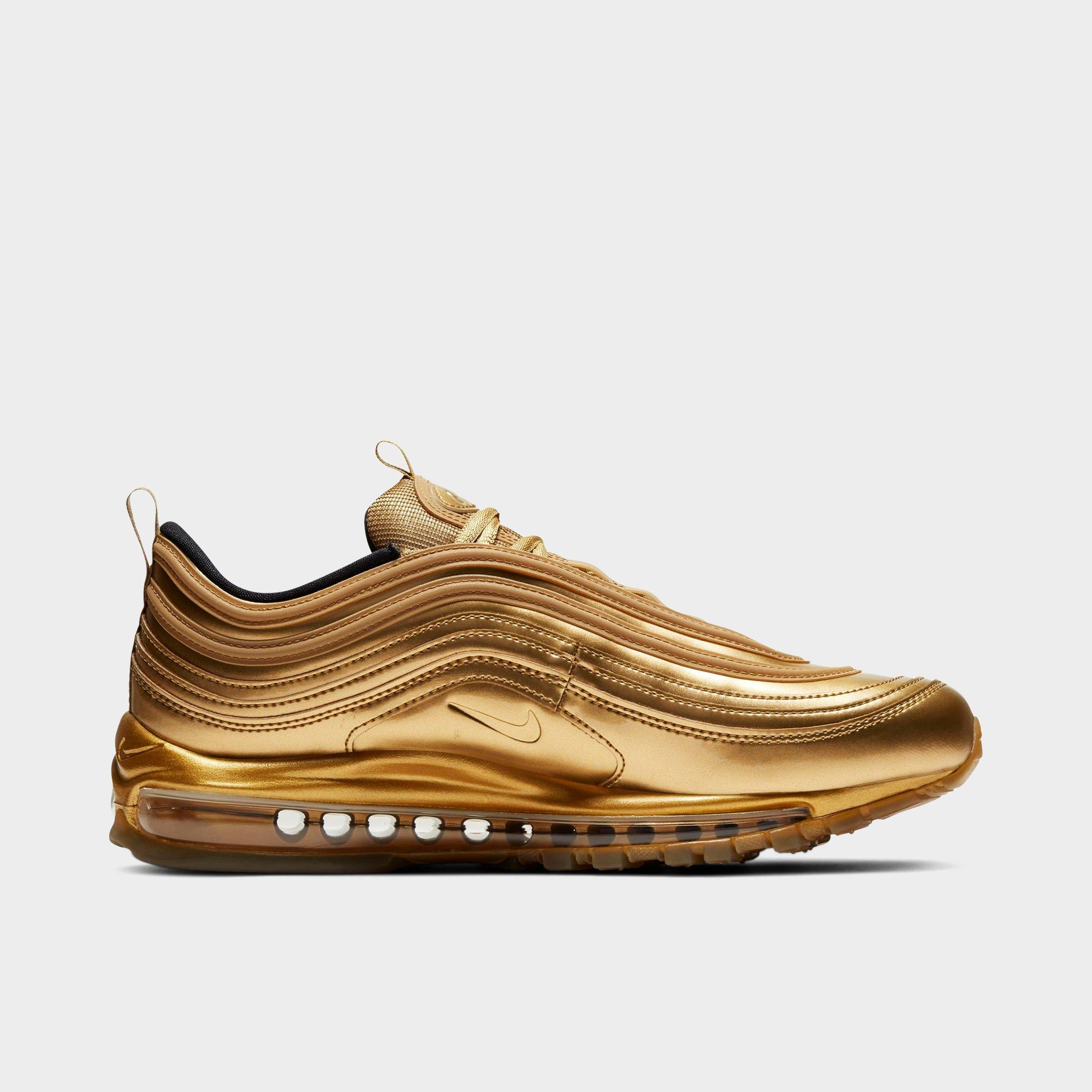 gold nike shoes