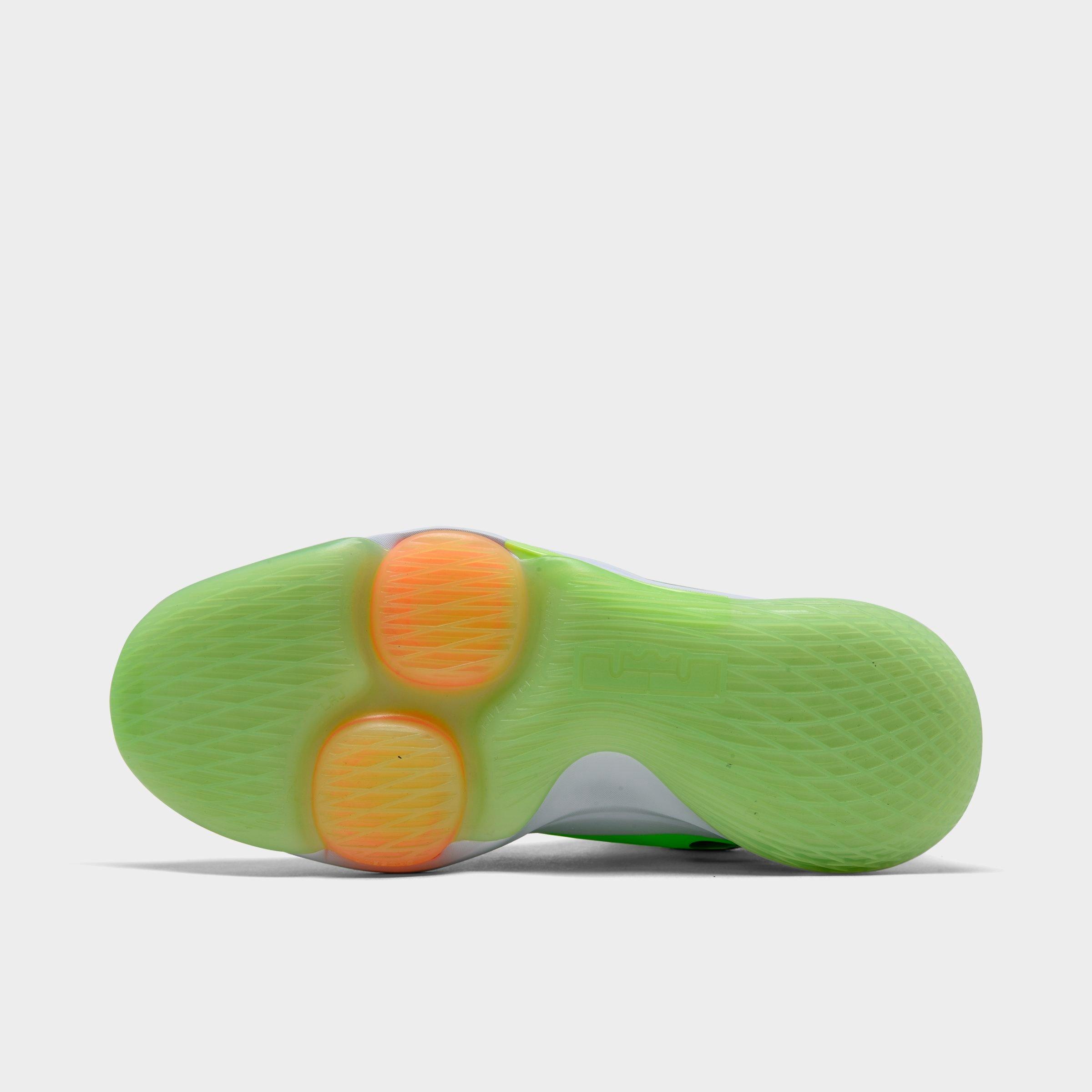 white basketball shoes with colorful bottom
