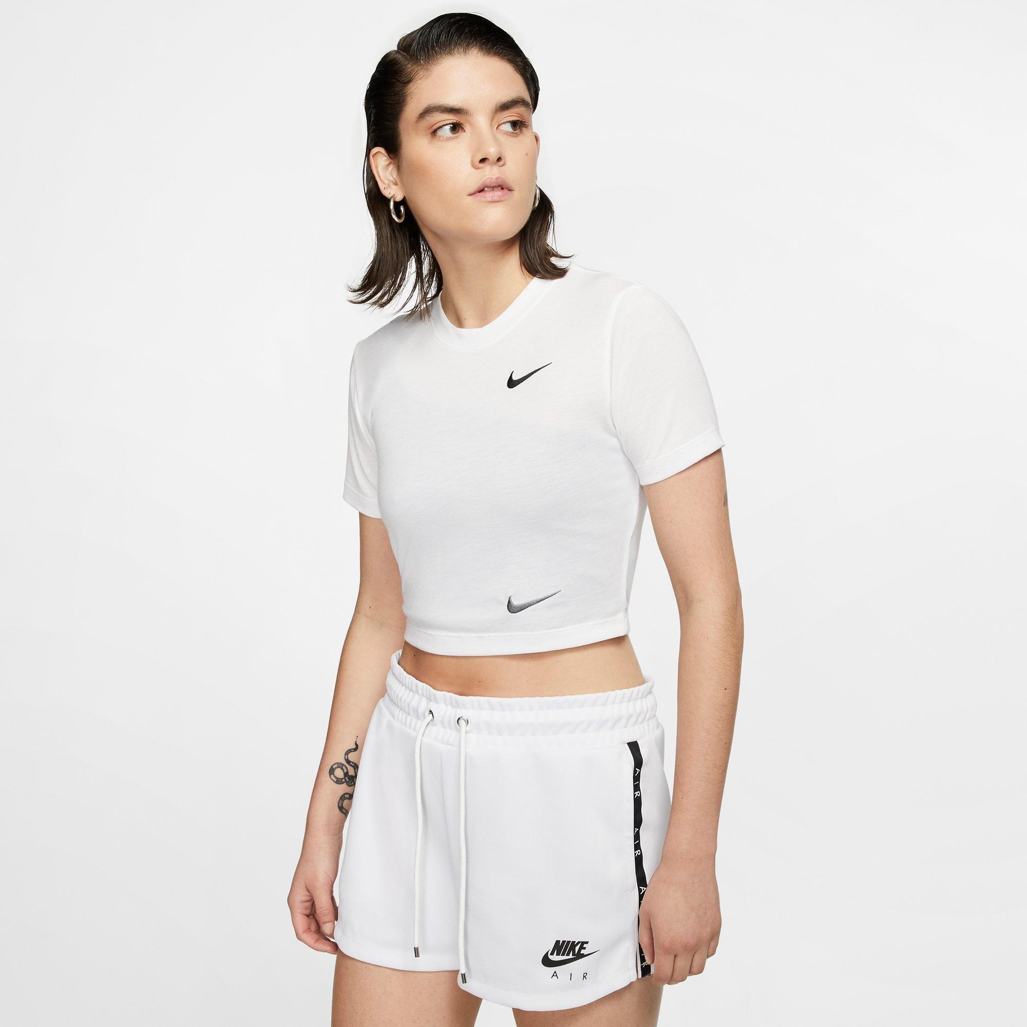 white and black nike crop top