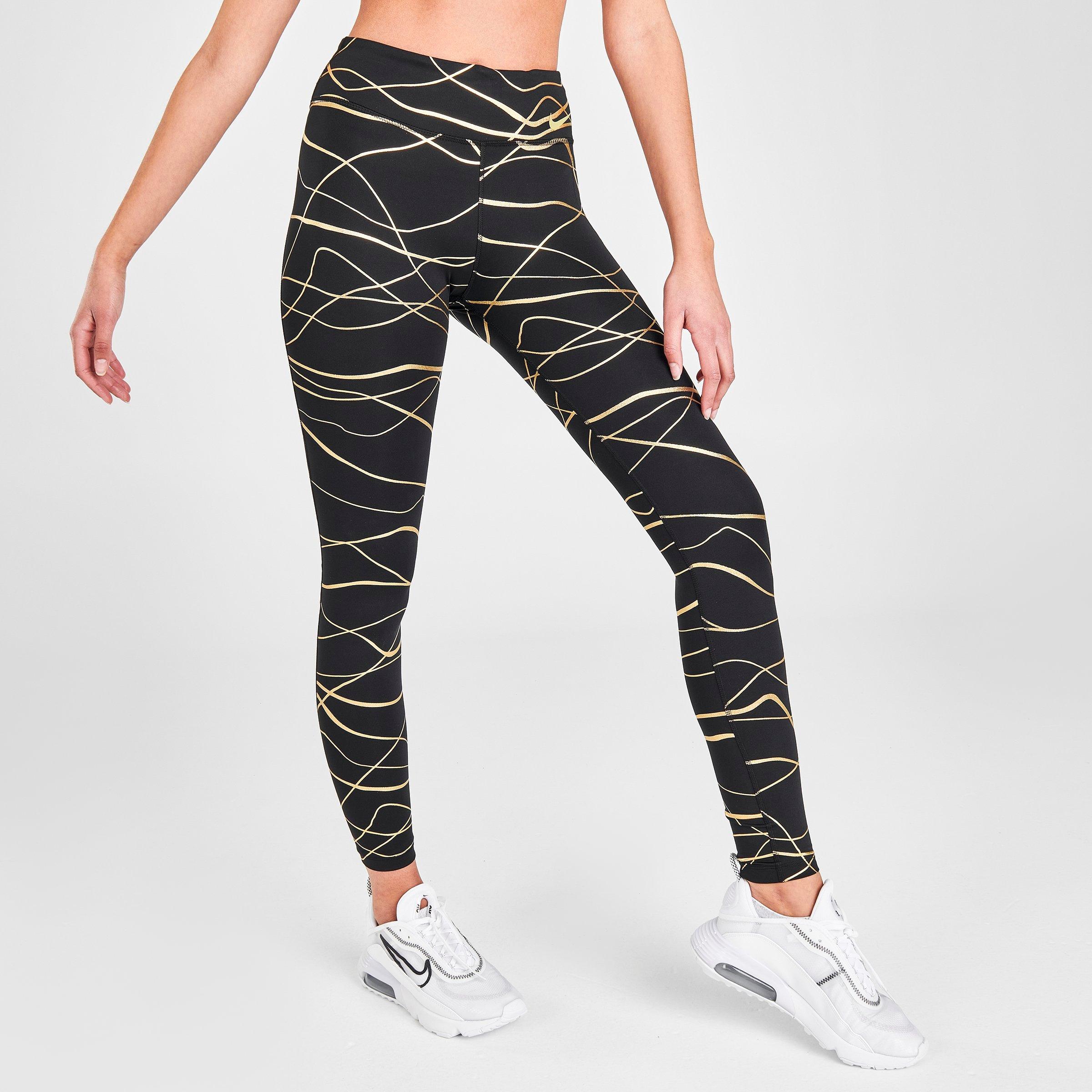 nike black and gold tights