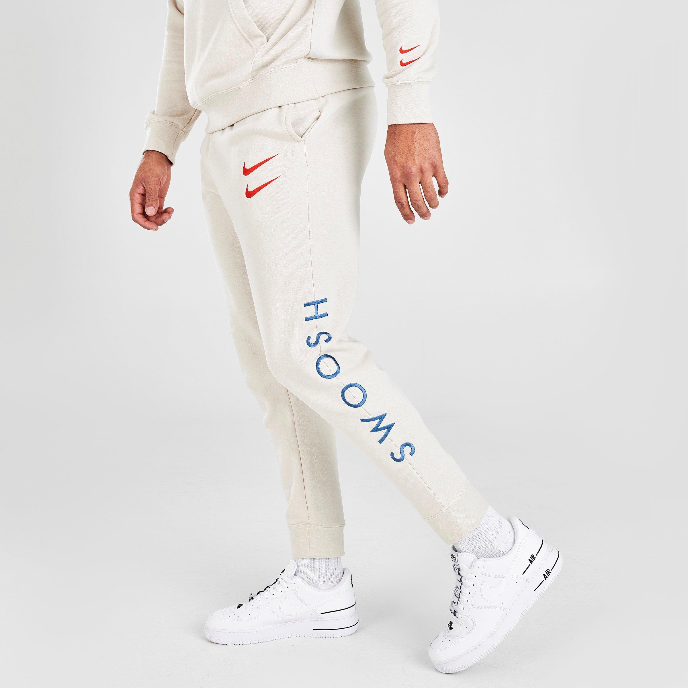 nike swoosh logo joggers