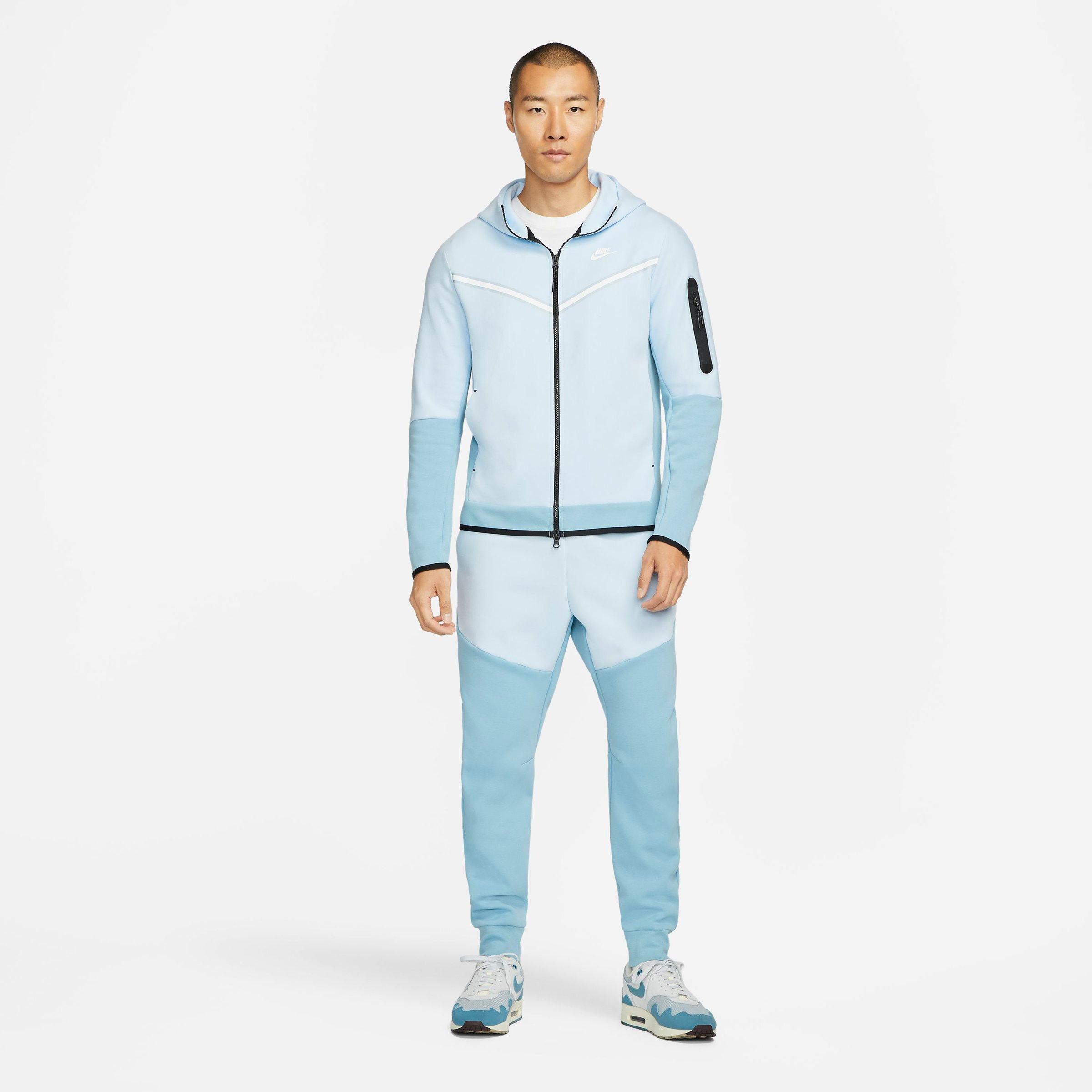 light blue nike tech tracksuit