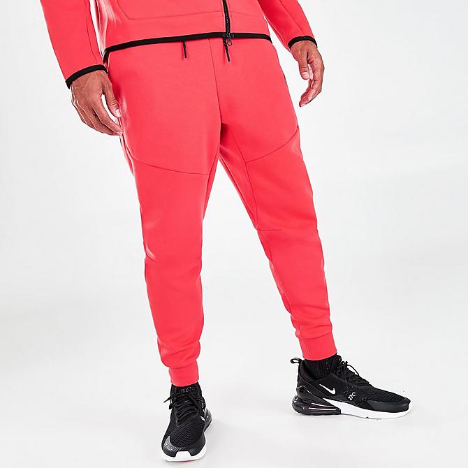 Back Left view of Nike Tech Fleece Taped Jogger Pants in Lobster/Black Click to zoom