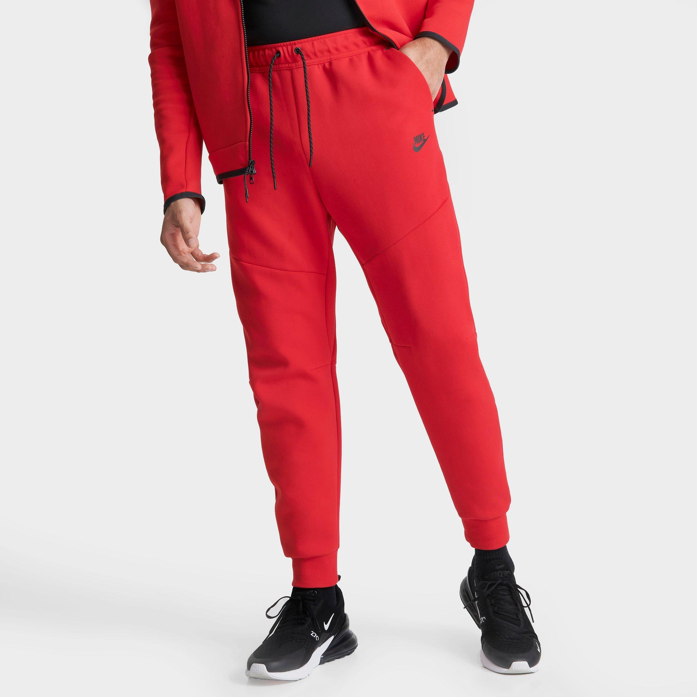 red nike tape joggers