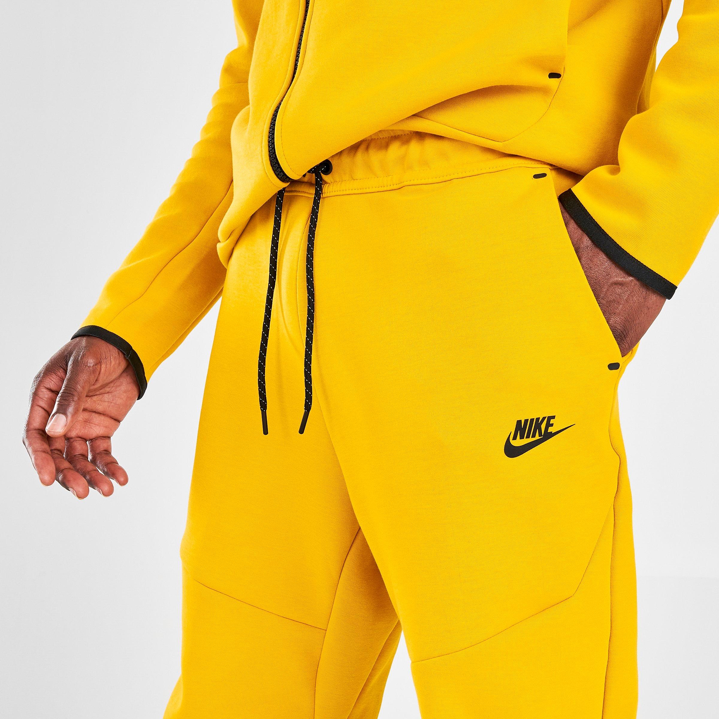 nike tech suit yellow