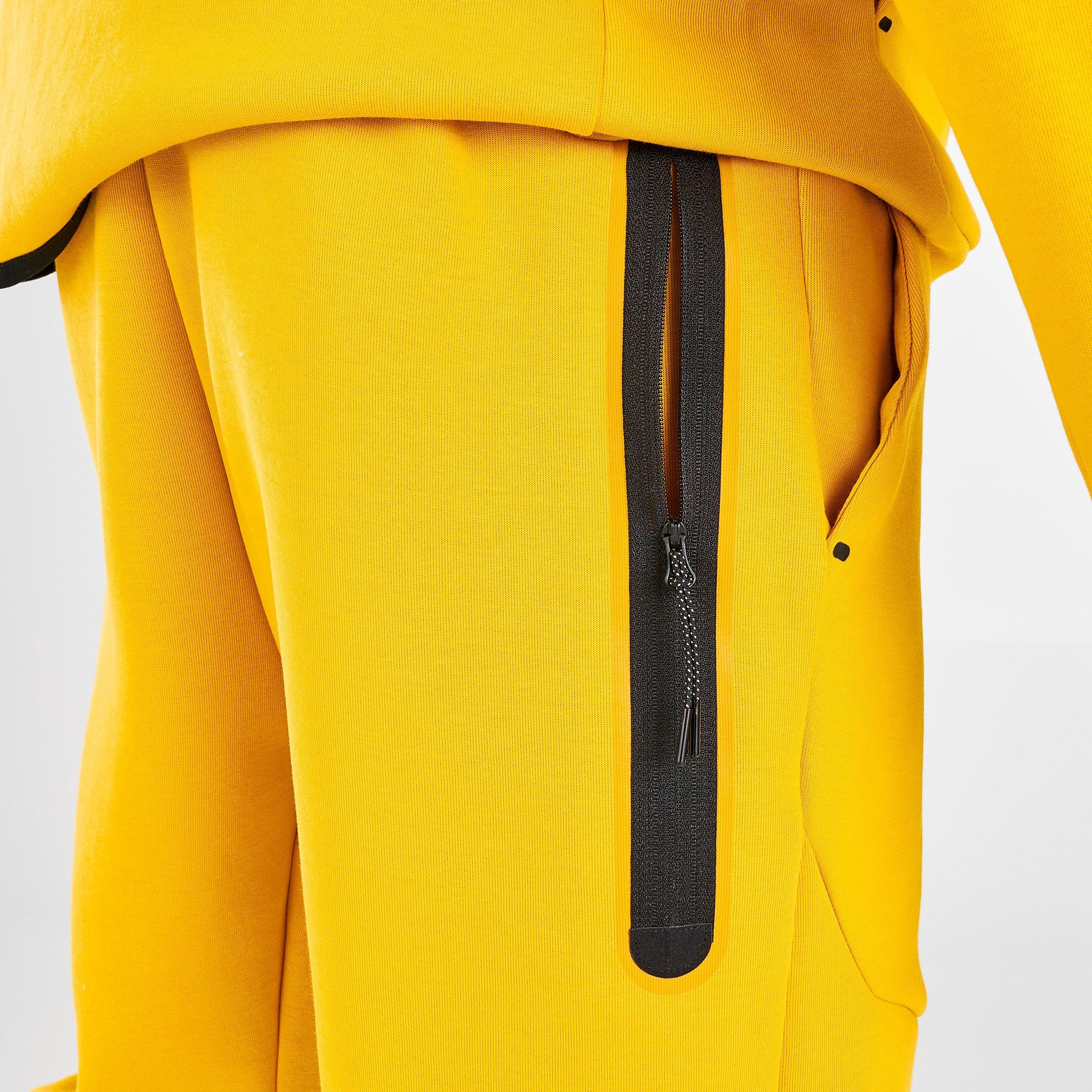 nike tech fleece pants yellow