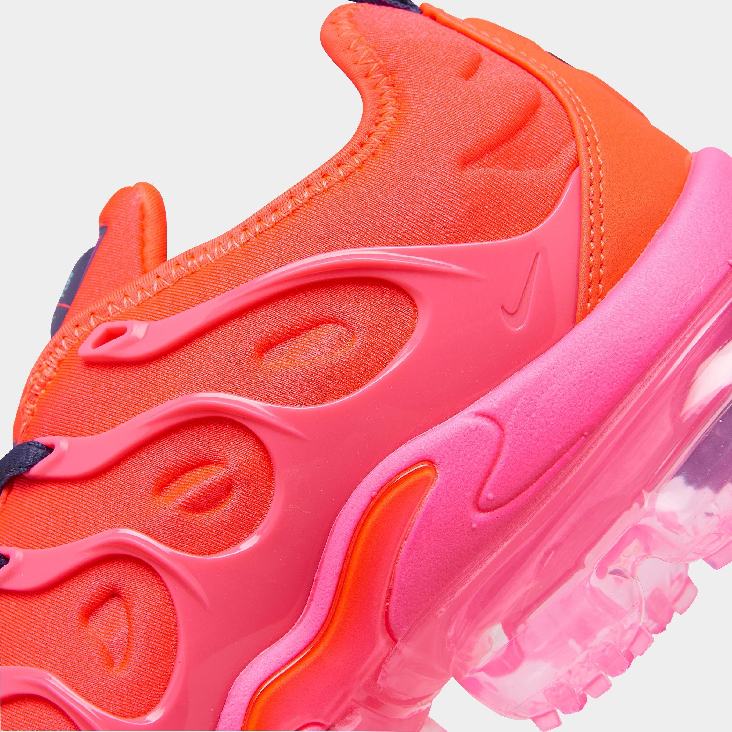 orange and pink vapormax plus
