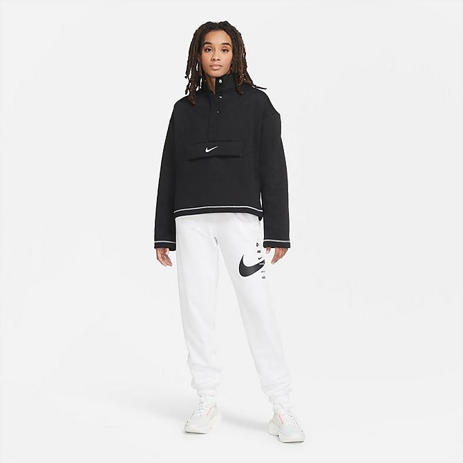 Front Three Quarter view of Women's Nike Sportswear SWOOSH Quarter-Snap Top in Black/White Click to zoom