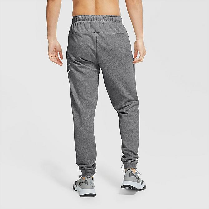 Front Three Quarter view of Men's Nike Dri-FIT Futura Swoosh Tapered Jogger Pants in Charcoal Heather/White Click to zoom