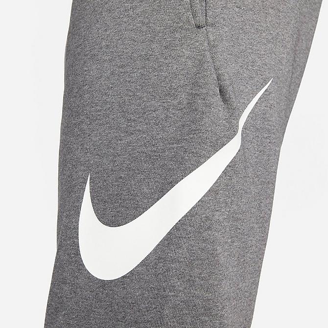On Model 5 view of Men's Nike Dri-FIT Futura Swoosh Tapered Jogger Pants in Charcoal Heather/White Click to zoom