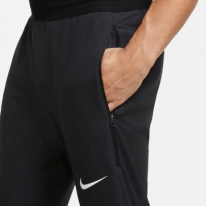 Back Right view of Men's Nike Therma Sphere Woven Jogger Pants in Black/White Click to zoom