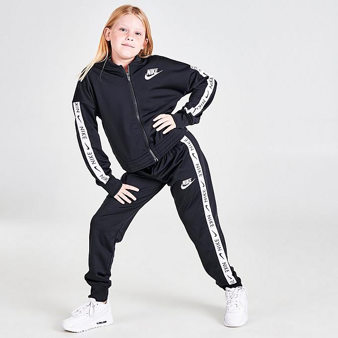 Front view of Girls' Nike Sportswear Taped Track Suit in Black/White Click to zoom