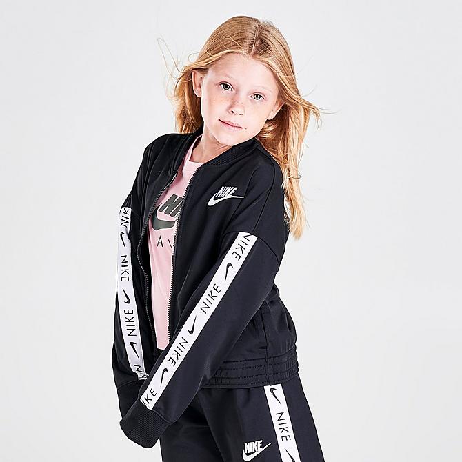 Back Left view of Girls' Nike Sportswear Taped Track Suit in Black/White Click to zoom