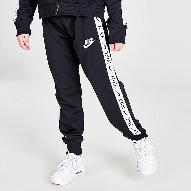 Back Right view of Girls' Nike Sportswear Taped Track Suit in Black/White Click to zoom