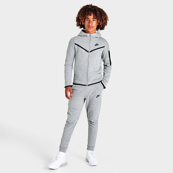 Front Three Quarter view of Kids' Nike Sportswear Tech Fleece Jogger Pants in Dark Grey Heather/Black Click to zoom
