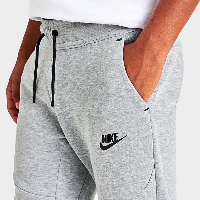 On Model 5 view of Kids' Nike Sportswear Tech Fleece Jogger Pants in Dark Grey Heather/Black Click to zoom