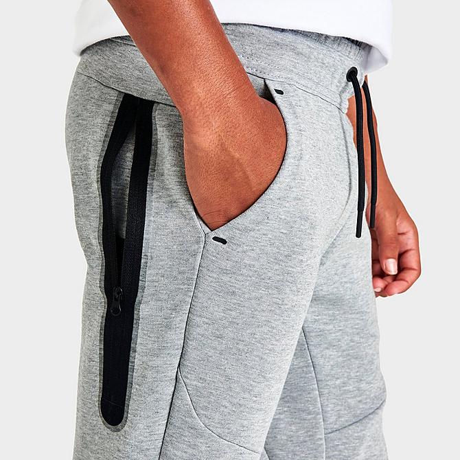 On Model 6 view of Kids' Nike Sportswear Tech Fleece Jogger Pants in Dark Grey Heather/Black Click to zoom
