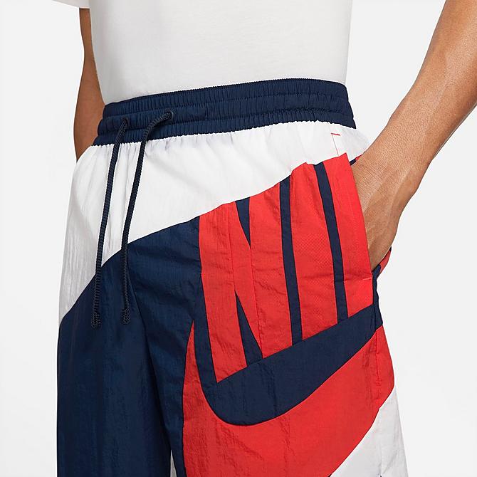 On Model 5 view of Men's Nike Dri-FIT Throwback Futura Basketball Shorts in White/College Navy/Chile Red Click to zoom