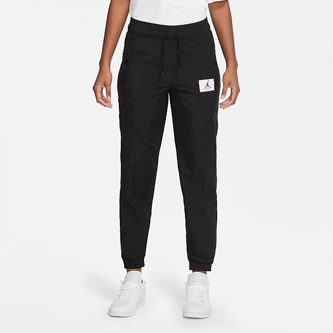 Front Three Quarter view of Women's Jordan Woven Jogger Pants in Black/Black Click to zoom