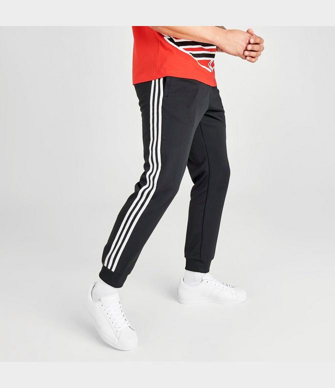 Illussion: Adidas Originals Adicolor Locked Up Logo Track Pants In Black