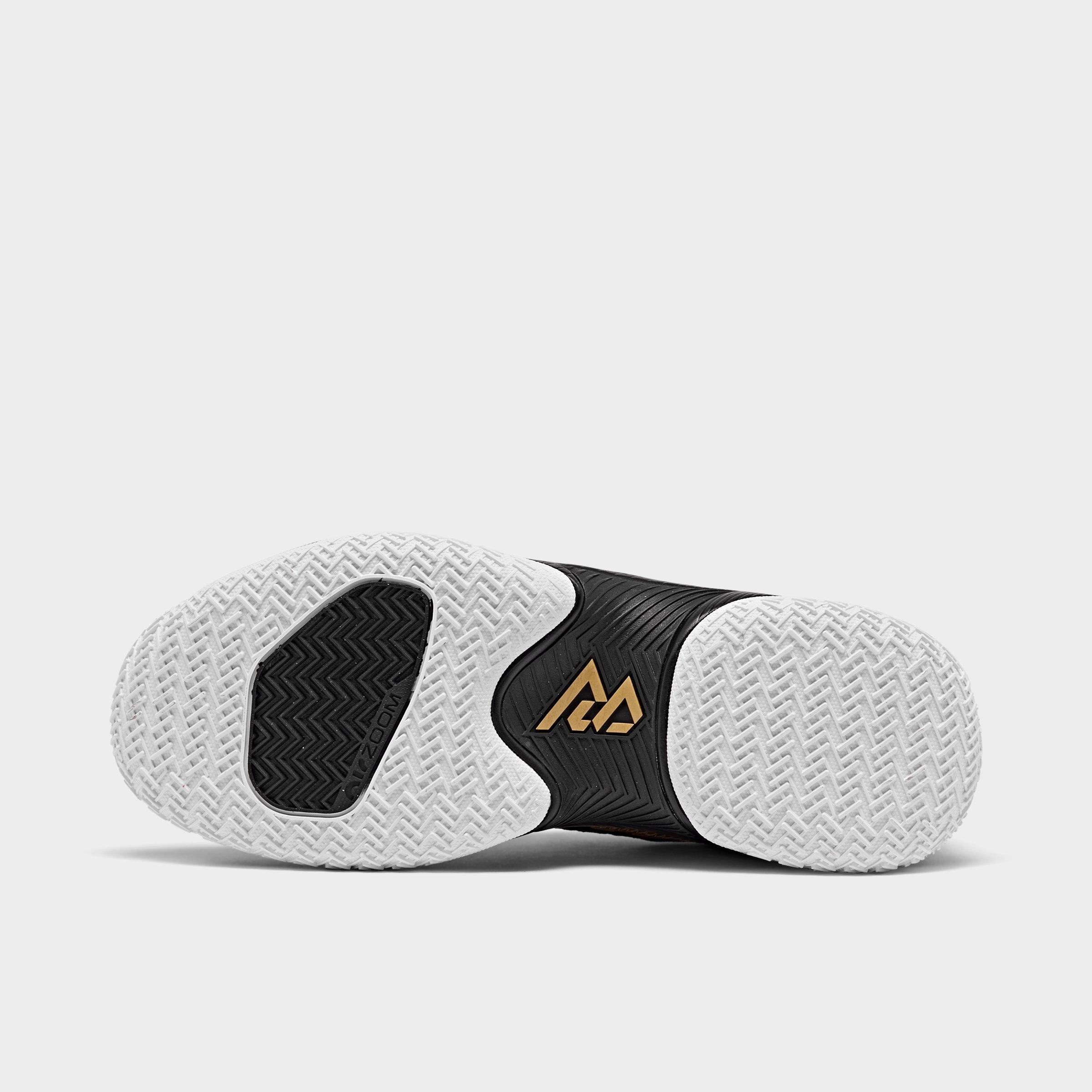 basketball shoes one white one black