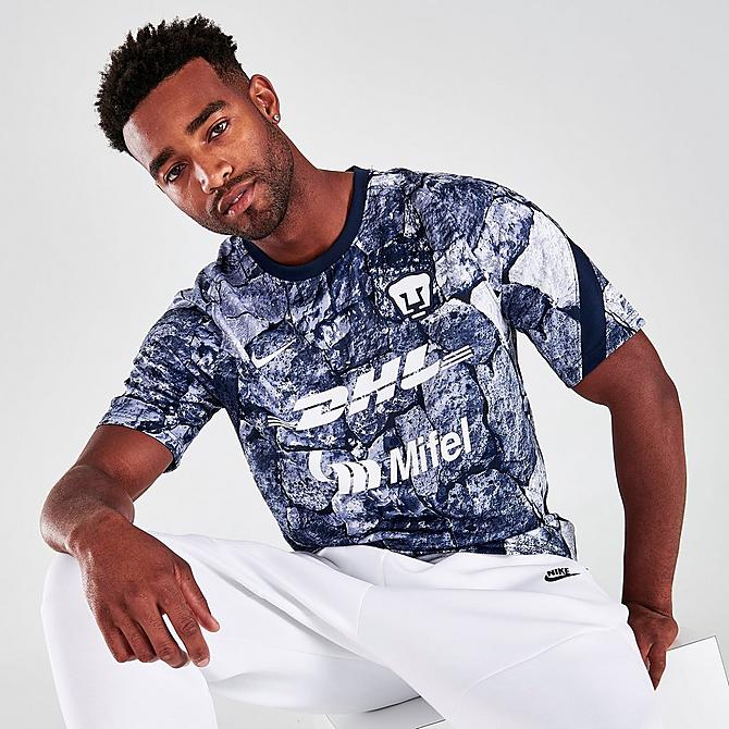 [angle] view of Men's Nike Pumas UNAM Pre-Match Dri-FIT Soccer T-Shirt in White/Obsidian/Obsidian/White Click to zoom