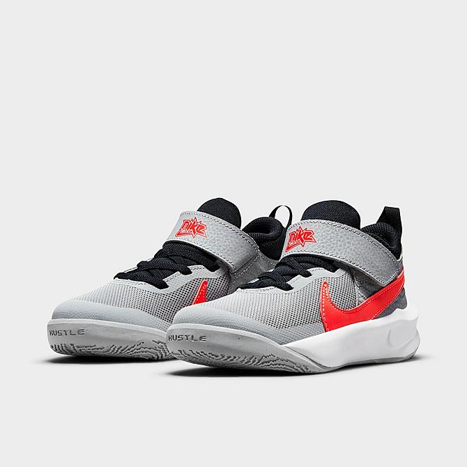 Three Quarter view of Little Kids' Nike Team Hustle D 10 Basketball Shoes in Light Smoke Grey/Bright Crimson/Dark Obsidian Click to zoom