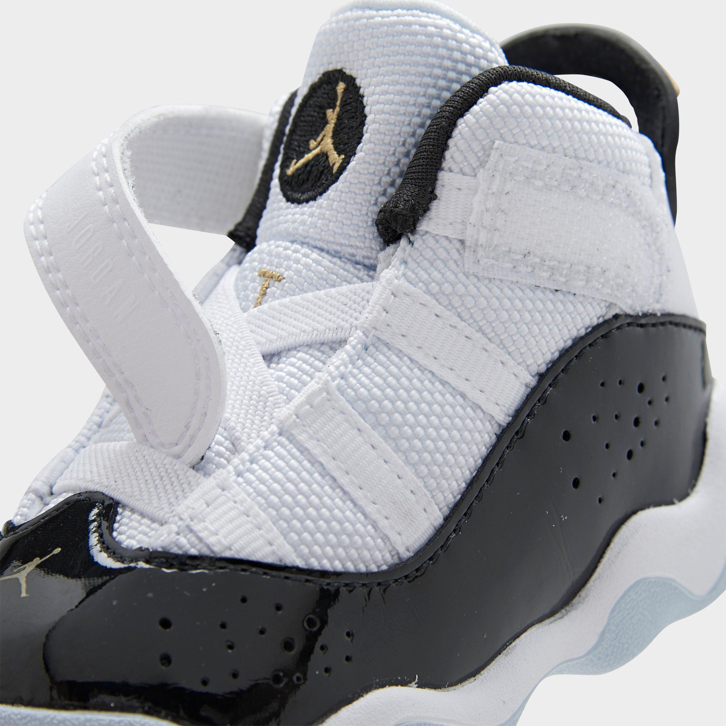 toddler black and gold jordans