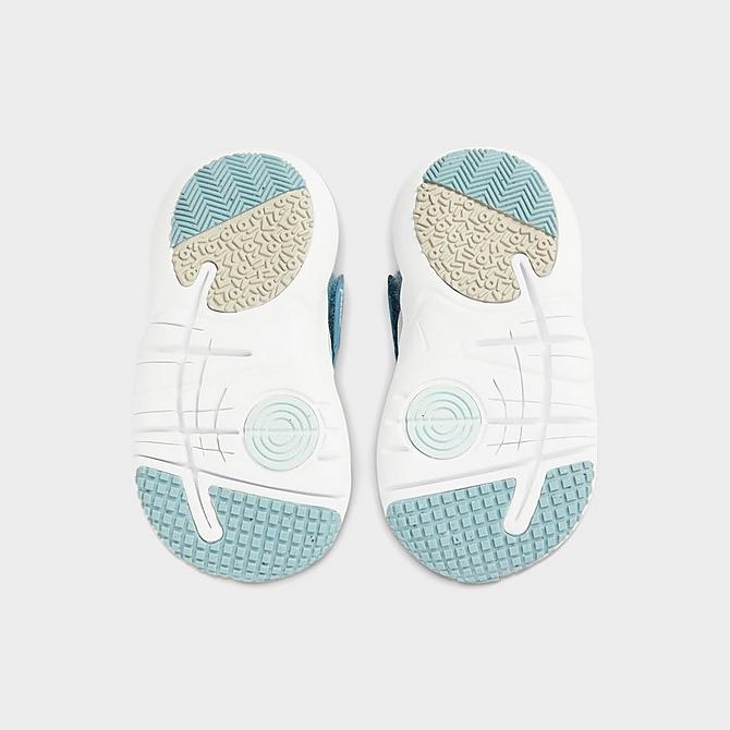 Bottom view of Kids' Toddler Nike Flex Advance Running Shoes in Light Bone/Glacier Blue-Cerulean Click to zoom
