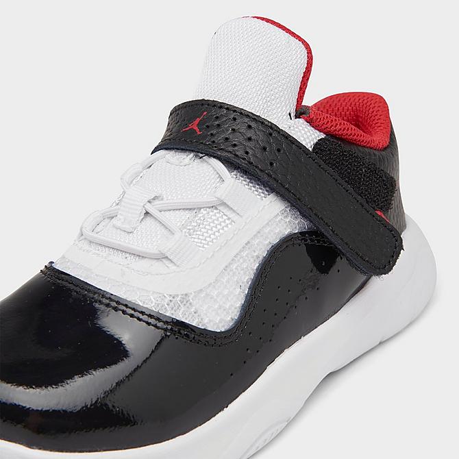 Front view of Kids' Toddler Air Jordan 11 CMFT Low Casual Shoes in White/University Red/Black Click to zoom