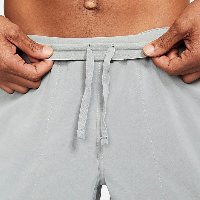 On Model 5 view of Men's Nike Yoga Dri-FIT Woven Shorts in Particle Grey/Black Click to zoom
