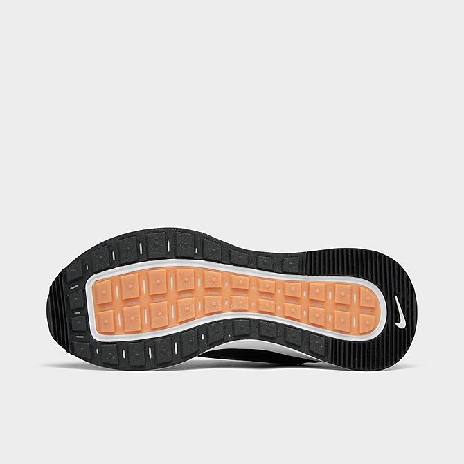 Bottom view of Women's Nike Reposto Casual Shoes in Black/Dark Smoke Grey/Gum Yellow/Iron Grey Click to zoom