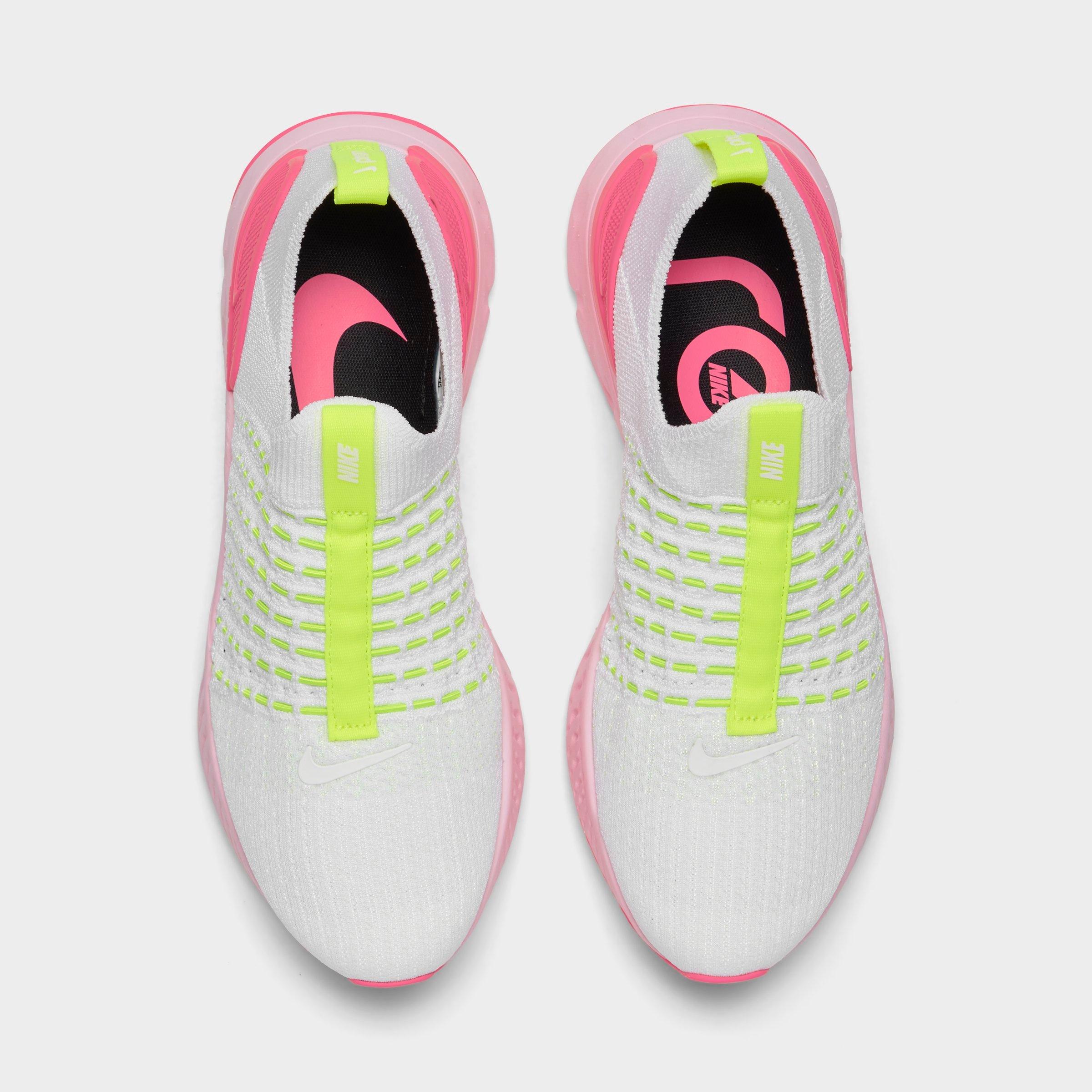 white and pink nike react