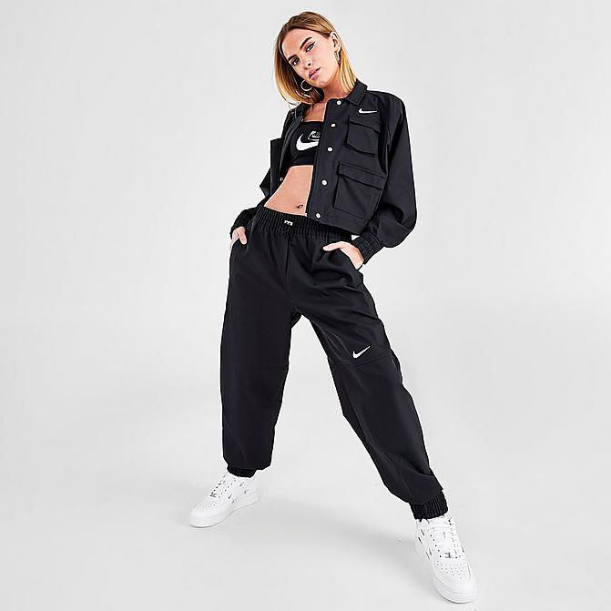 Front view of Women's Nike Sportswear Swoosh Woven Jogger Pants in Black Click to zoom