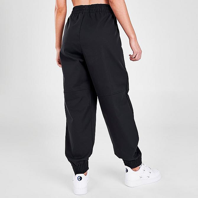 Back Right view of Women's Nike Sportswear Swoosh Woven Jogger Pants in Black Click to zoom