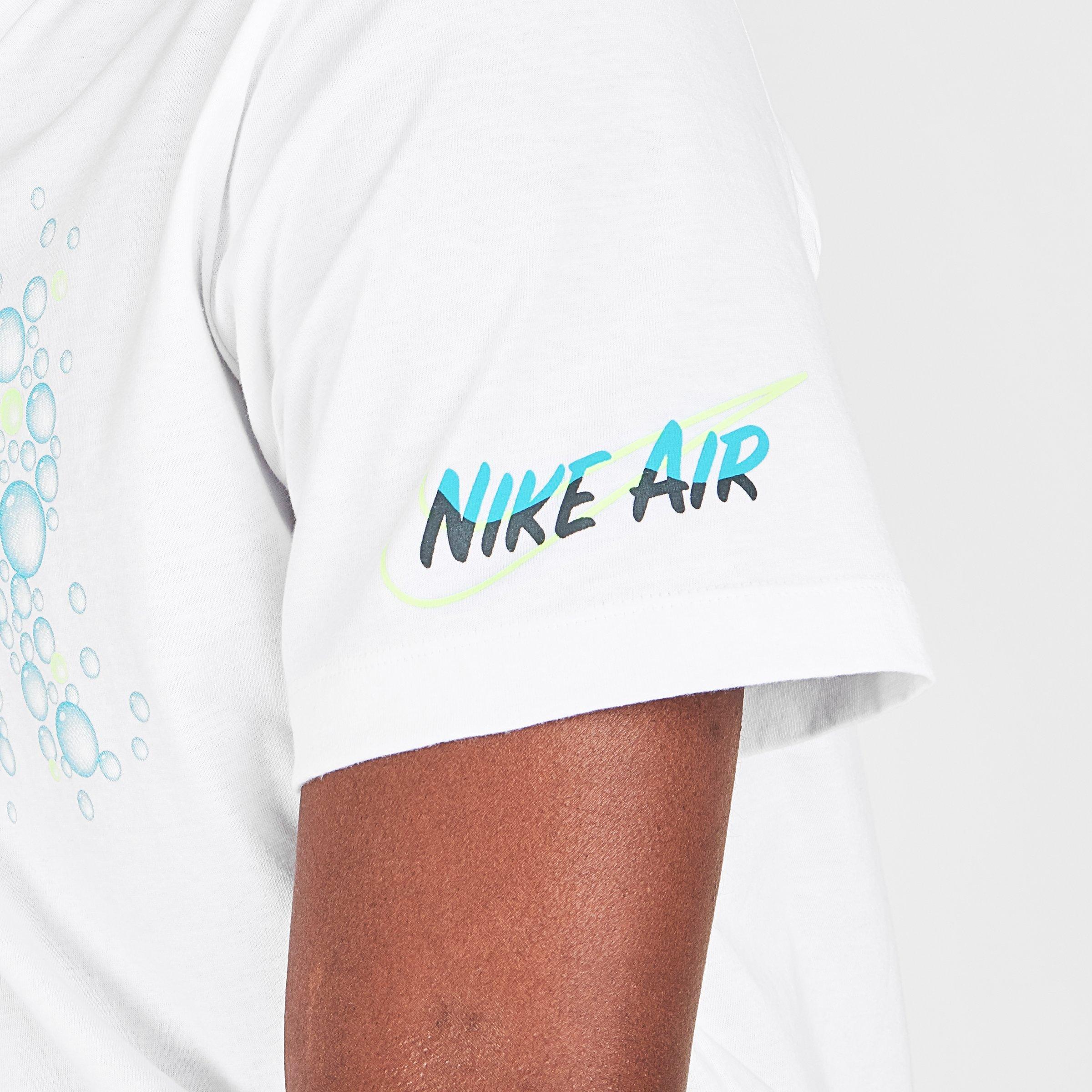 white and teal nike shirt