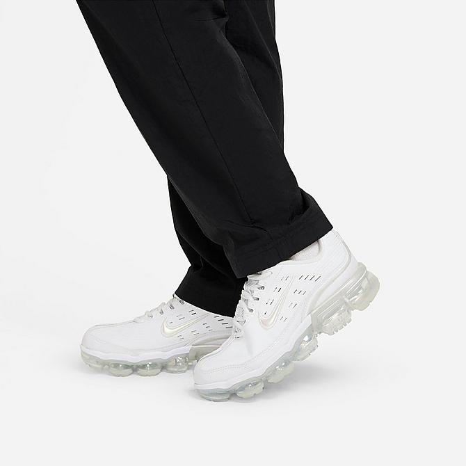 On Model 6 view of Women's Nike Air Woven Pants in Black/White Click to zoom