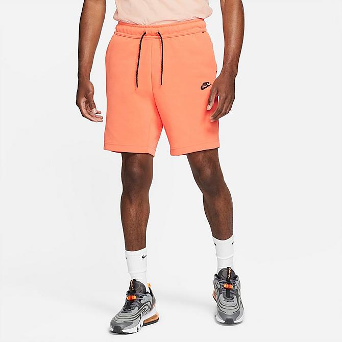 Front Three Quarter view of Men's Nike Sportswear Washed Tech Fleece Shorts in Orange Frost/Black Click to zoom