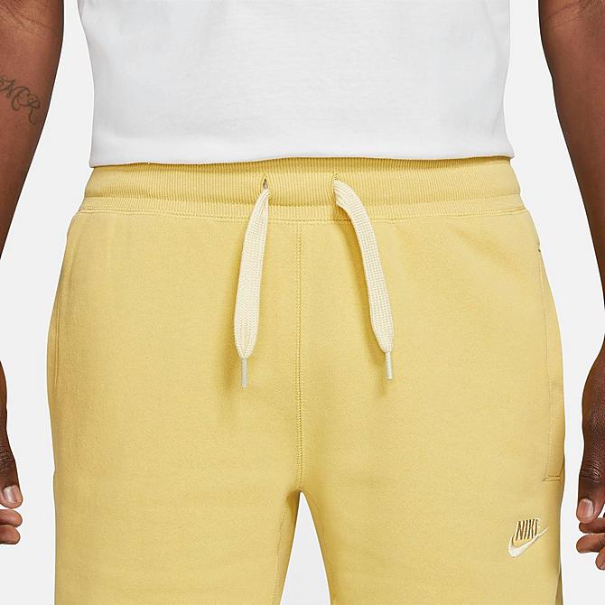 Back Right view of Men's Nike Sportswear Classic Fleece Shorts in Saturn Gold/Lemon Drop Click to zoom